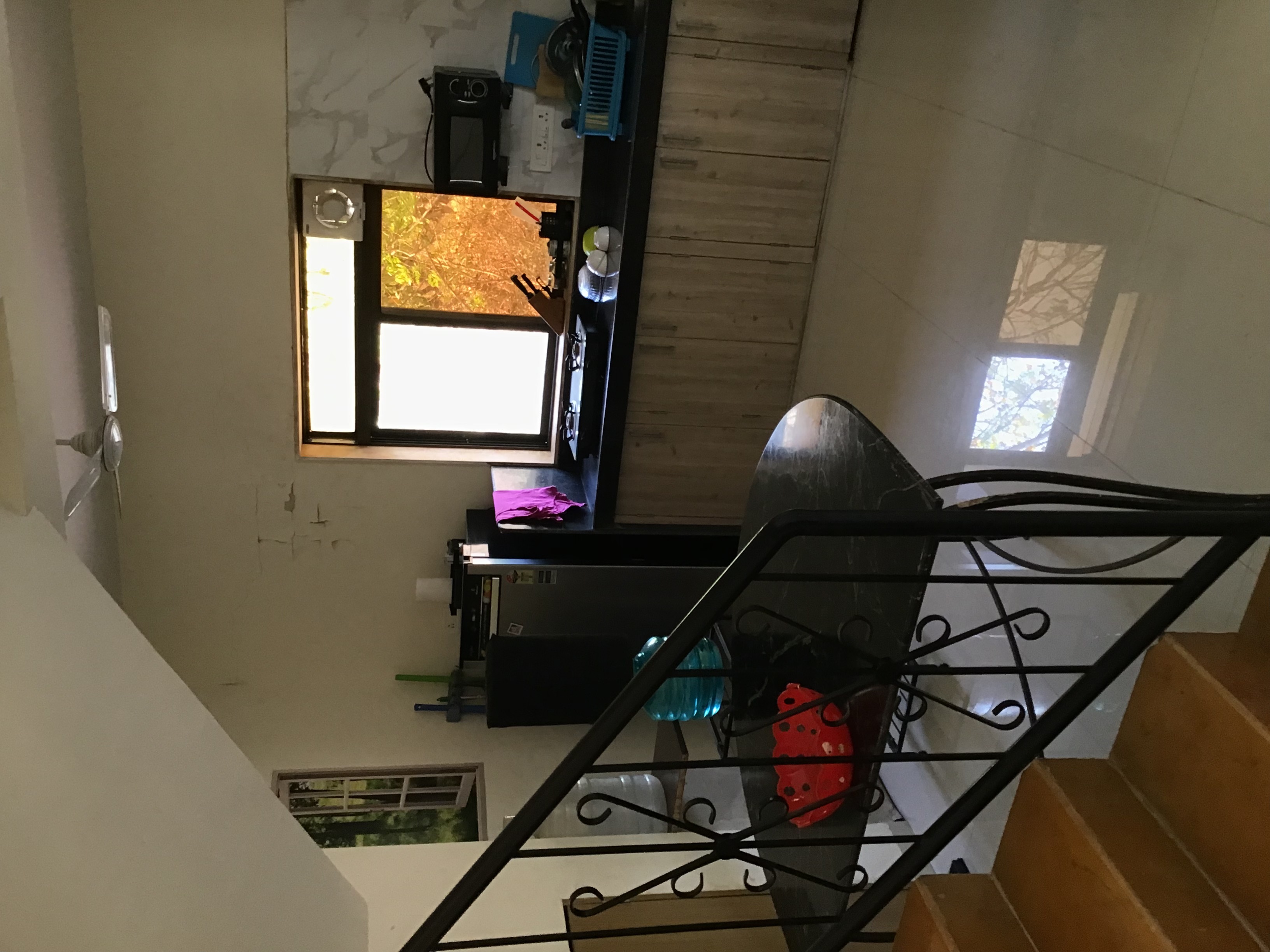Kitchen with stairs to go up